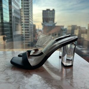 Black and clear heels